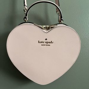 Kate Spade: iconic pink heart shaped purse